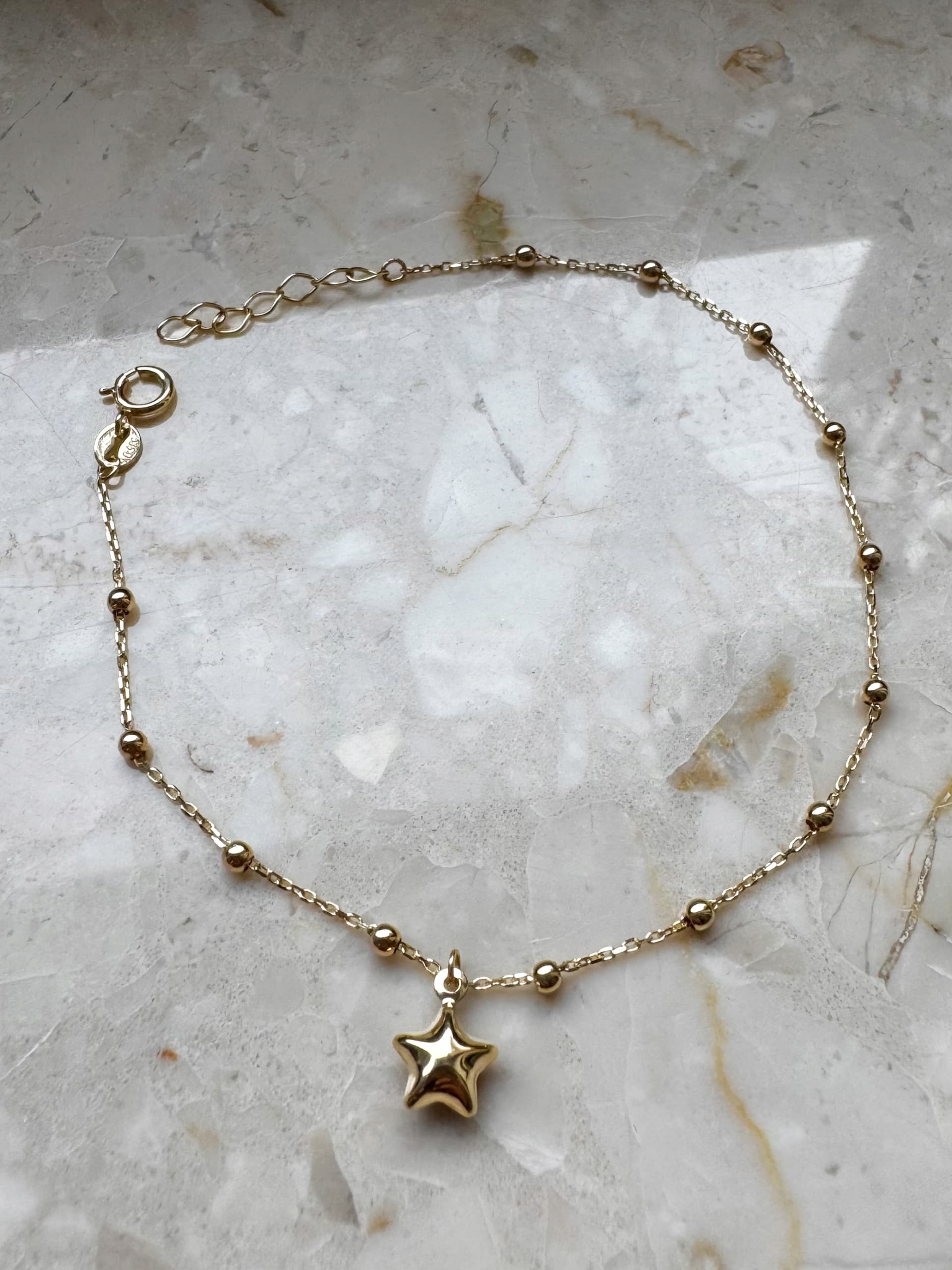 Złota bransoletka 585 GWIAZDKA WISZĄCA